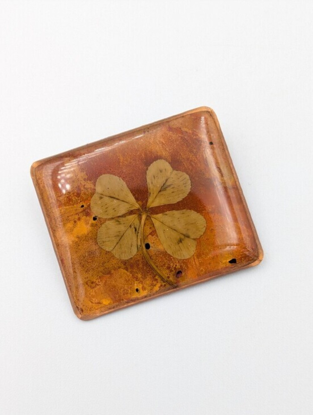 Vintage pressed four leaf clover in enamel on square brooch pin